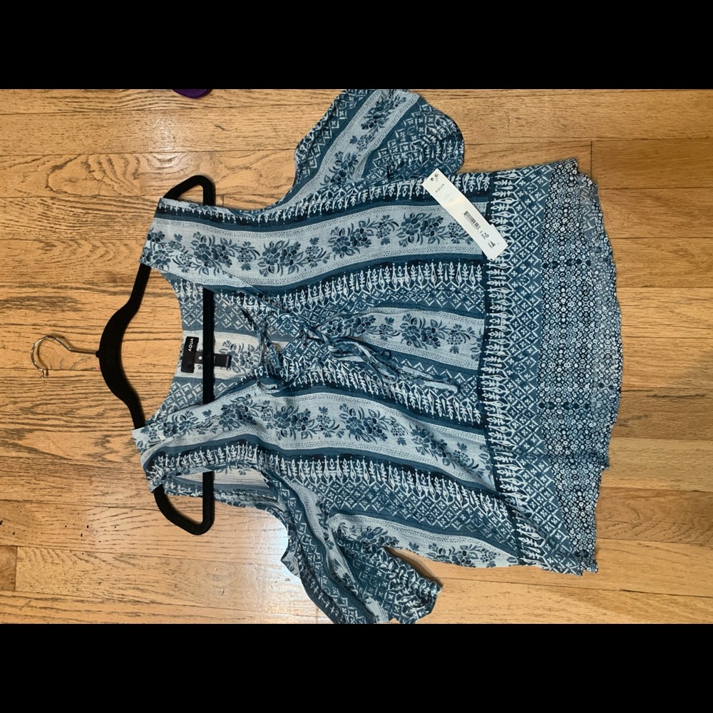 Aqua printed blouse. New with tags.